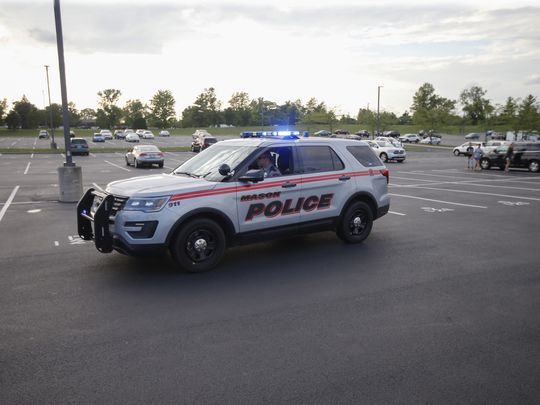 Police respond to a bomb threat at the Mason High School football game on Friday night