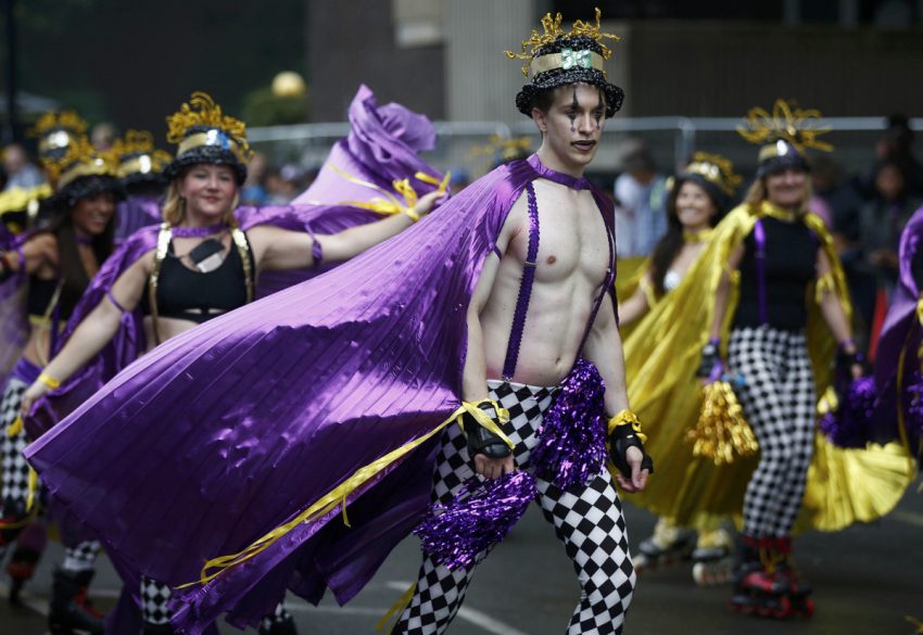 Performers participate in the children's day parade at the Notting Hill Carnival on August 28