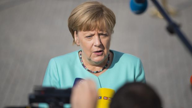 Polls point to heavy losses for Angela Merkel's Christian Democrats in Berlin