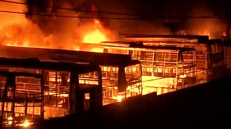 Cauvery row 30 buses set on fire in Bengaluru Centre rushes 10 RAF companies to Karnataka