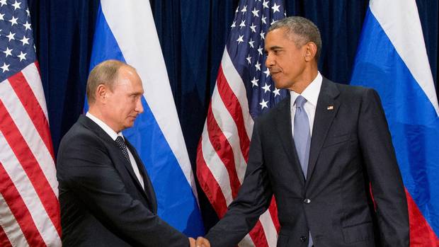 President Barack Obama shakes hands with Russian President President Vladimir Putin