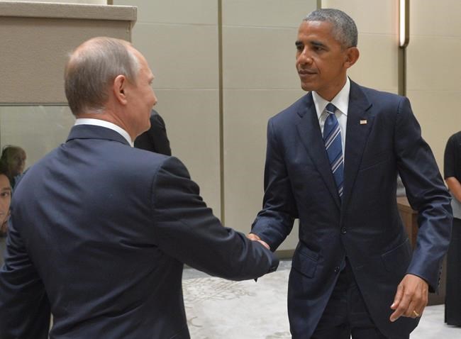 Russian President Vladimir Putin left shakes hands with U.S. President Barack Obama in Hangzhou in eastern China's Zhejiang province Monday Sept. 5 2016