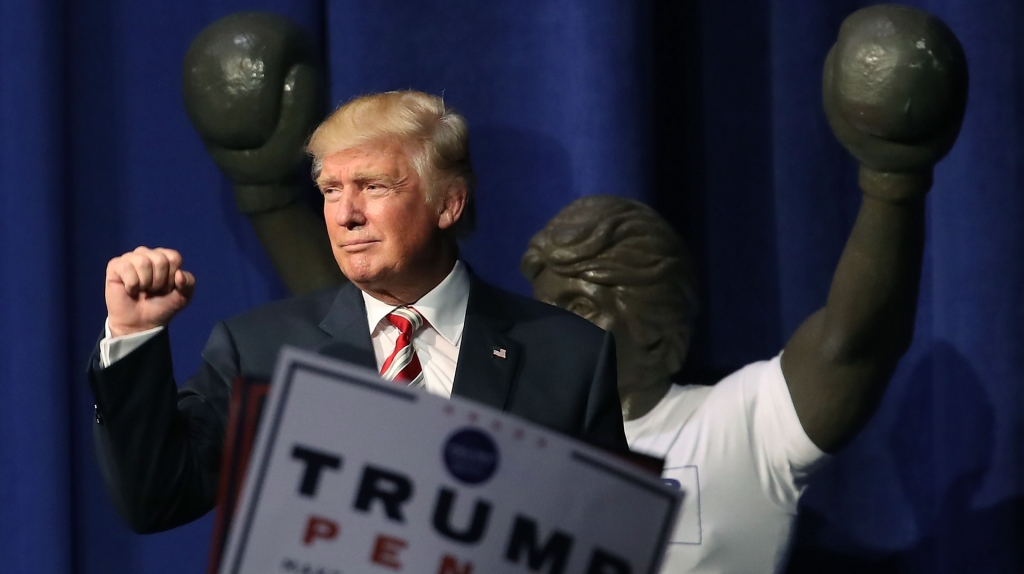 Republican presidential nominee Donald Trump gestures to the crowd after speaking during a campaign rally at the Sun Center Studios Sept. 22 2016 in Aston Pennsylvania