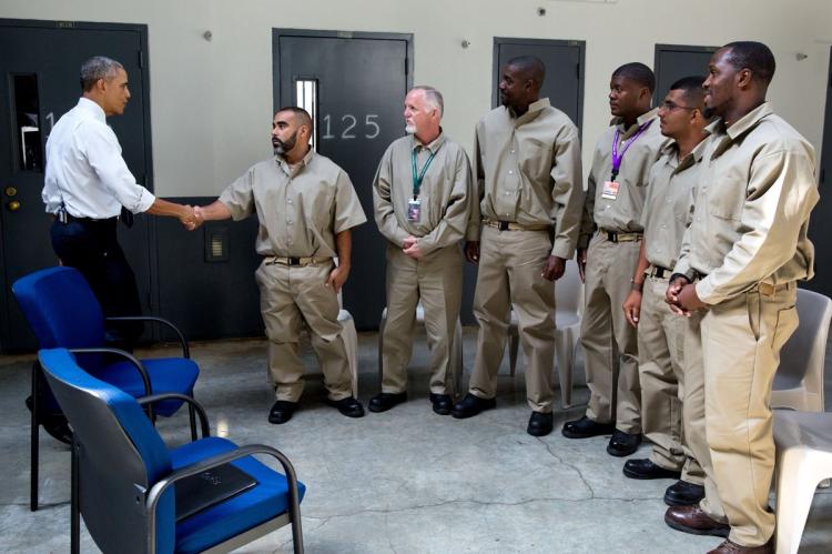 President Obama is seen greeting inmates during a 2015 visit to El Reno Federal Correctional Institution in El Reno Okla