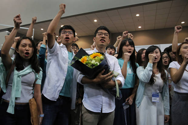 Young activists ride anti China mood to win Hong Kong vote