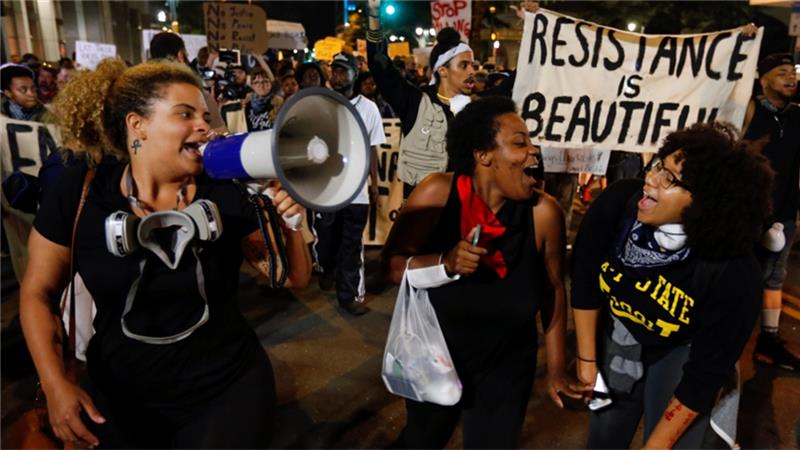 Protesters are outraged over the police killing of Keith Lamont Scott a 43-year-old father