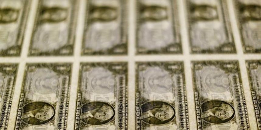 Dollar sags after Fed stands pat signals less aggressive rate rises