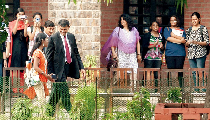 RBI governor Raghuram Rajan leaves after addressing the students of St Stephen’s College in New Delhi on Saturday. Pic  PTI