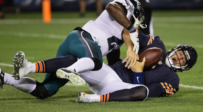 CHICAGO IL- SEPTEMBER 19 Quarterback Jay Cutler #6 of the Chicago Bears is sacked by Malcolm Jenkins #27 of the Philadelphia Eagles in the first quarter at Soldier Field