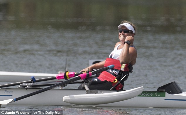 Rachel Morris celebrates her astonishing feat of becoming Paralympic champion in two sports