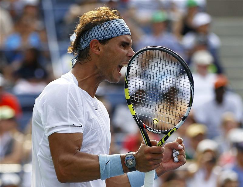 Rafael Nadal of Spain celebrates after his win over Ivan Dodig of Croatia at the U.S. Open tennis championships in New York