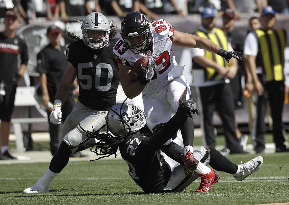 Atlanta tight end Jacob Tamme, defended by Raiders free safety Reggie Nelson and linebacker Ben Heeney and other Falcons receivers were continually open Sunday in Oakland