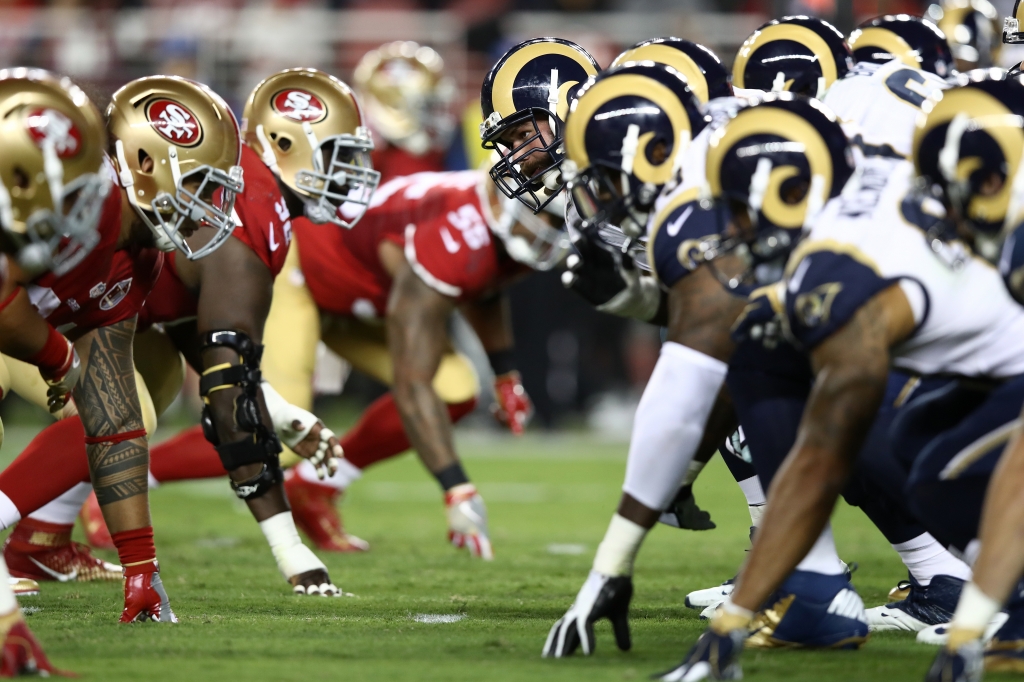 SANTA CLARA CA- SEPTEMBER 12 The Los Angeles Rams line up against the San Francisco 49ers during their NFL game at Levi's Stadium