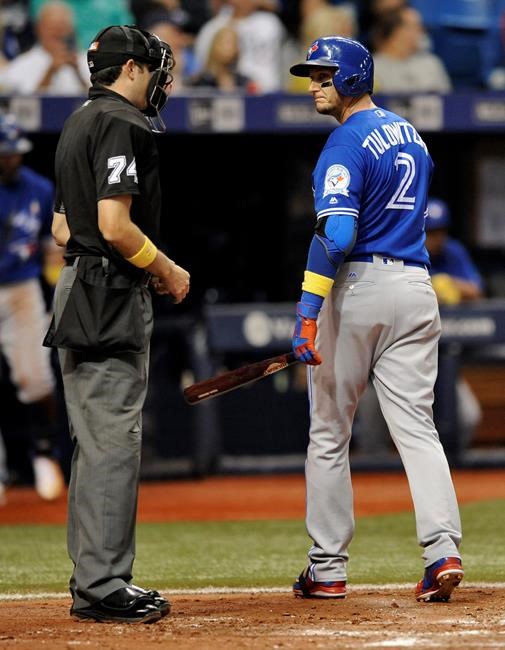 Toronto Blue Jays&#39 Troy Tulowitzki right looks toward home plate umpire John Tumpane after a called third strike from Tampa Bay Rays starter Alex Cobb during the fourth inning of a baseball game Friday Sept. 2 2016 in St. Petersburg Fla. (AP Pho