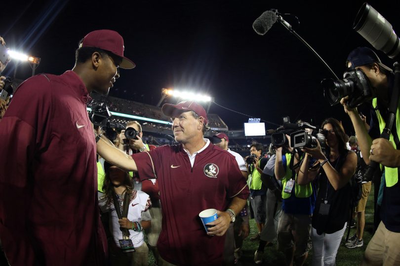 Sep 5 2016 Orlando FL USA Florida State Seminoles head coach Jimbo Fisher greets former Florida State Seminoles player and Tampa Bay Buccaneers quarterback Jameis Winston after the game against the Mississippi Rebels at Camping World Stadium. Florida