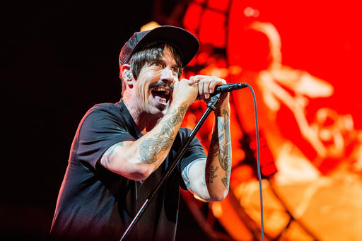 Anthony Kiedis of Red Hot Chili Peppers performs at Lollapalooza in Chicago. The band will perform at the Los Angeles Memorial Coliseum before the Rams take on the Seattle Seahawks. The Rams moved to Los Angeles