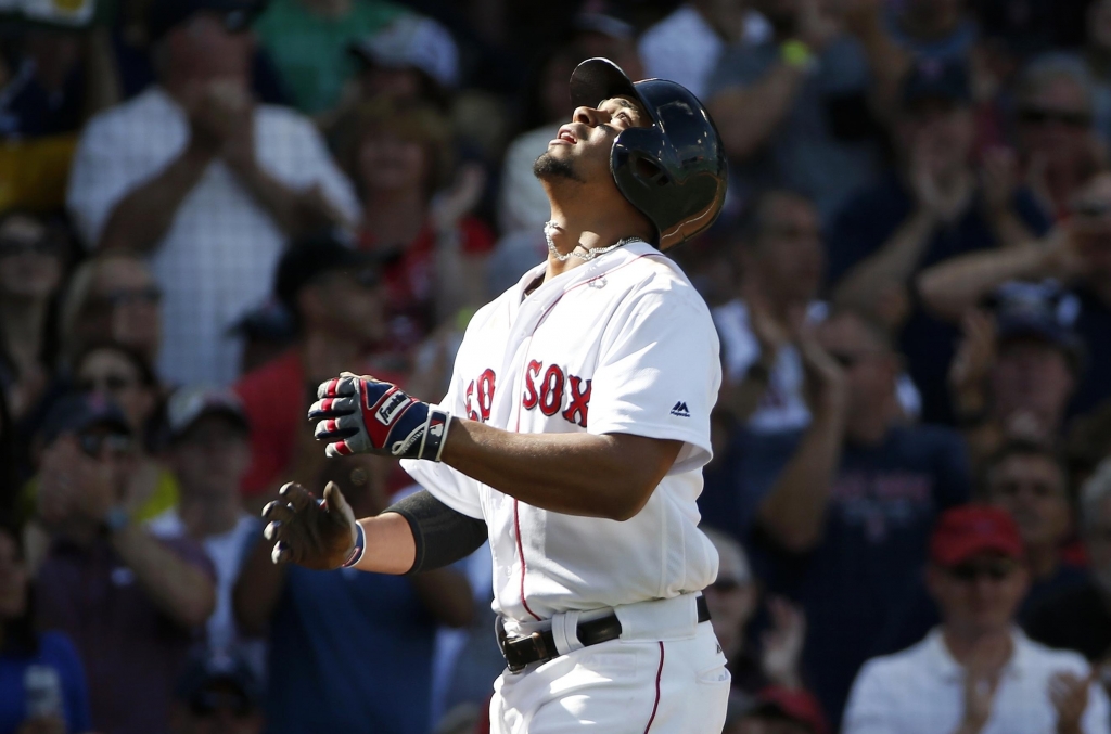 Red Sox's Xander Bogaerts looks up as he crosses home plate after hitting a two-run shot against New York