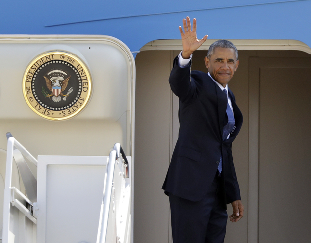 President Barack Obama waves as he boards Air Force One at Andrews Air Force Base Md. Wednesday Aug. 31 2016 for a trip to Lake Tahoe Nev. Obama will