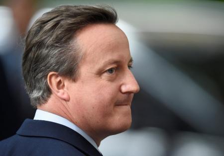 Britain's outgoing Prime Minister David Cameron pauses during his speech in front of number 10 Downing Street on his last day in office as Prime Minister in central London Britain