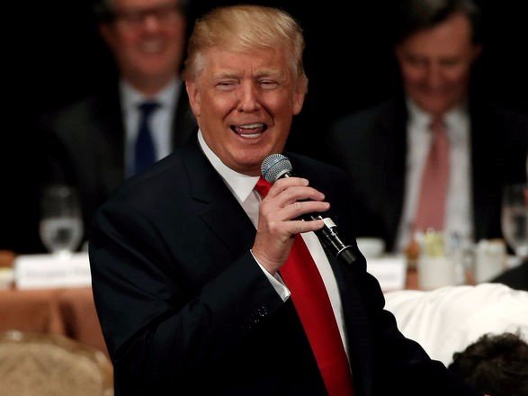 Republican presidential nominee Donald Trump gestures as he speaks to the Economic Club of New York luncheon in Manhattan New York U.S