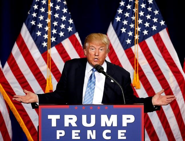 Republican presidential candidate Donald Trump speaks during a campaign rally at the Phoenix Convention Center in Phoenix. Trump and Hillary Clinton are making competing Labor Day pitches in Ohio setti