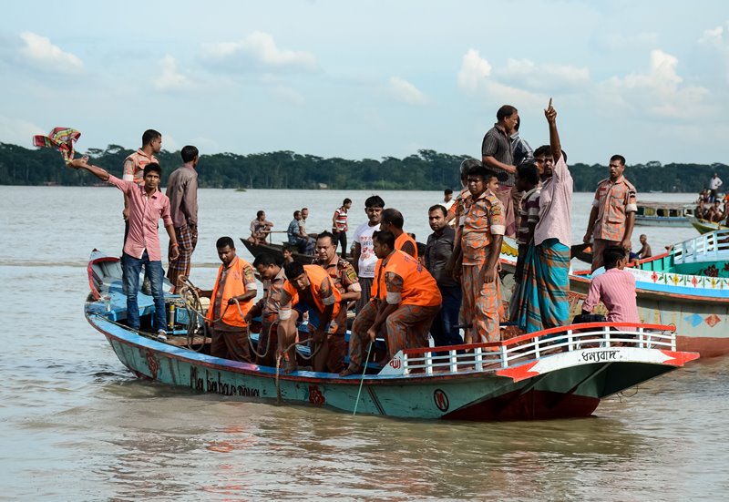 Rescue workers look for survivors after a ferry sank in the southern district of Barisal Bangladesh