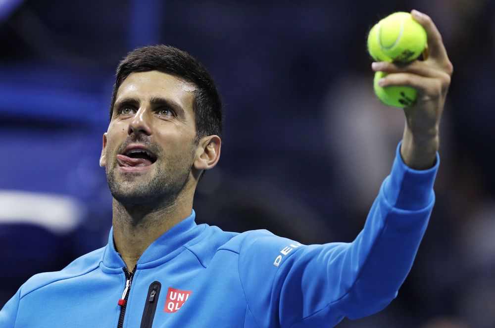 Novak Djokovic of Serbia looks toward the crowd after his match against Jo Wilfried Tsonga of France during the quarterfinals of the U.S. Open tennis tournament Tuesday Sept. 6 2016 in New York. Tsonga retired from the match due to injury at the