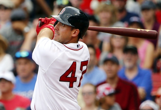 Restored to the lineup Shaw hit a home run and knocked in another run in Boston's 7-2 victory