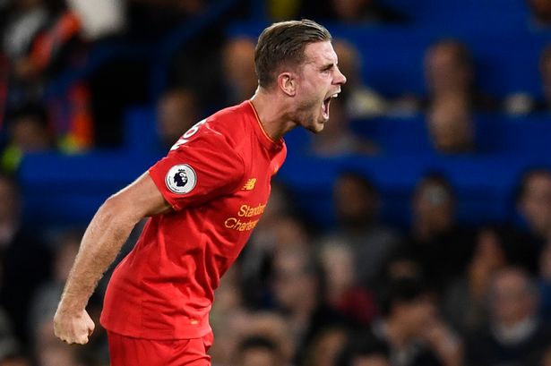 Liverpool's Jordan Henderson celebrates scoring their second goal