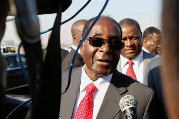 Reuters

Zimbabwe's President Robert Mugabe arrives home from abroad at the capital's main airport in Harare