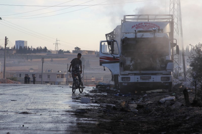 ReutersA damaged aid truck after an airstrike on the rebel-held Urm al Kubra town western Aleppo