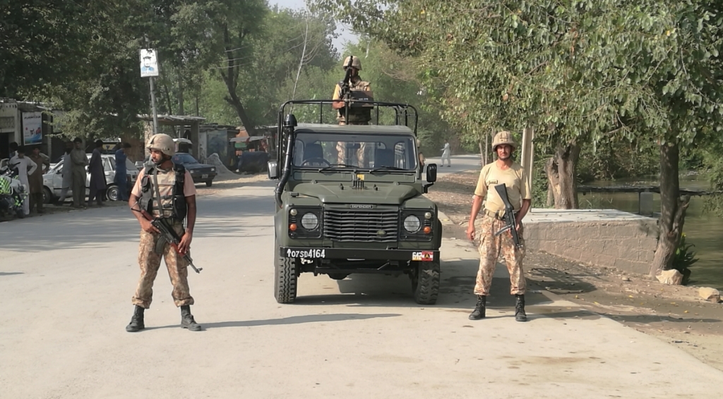 ReutersArmy soldiers stand guard at a street after four suicide bombers attacked a Christian colony near Peshawar Pakistan