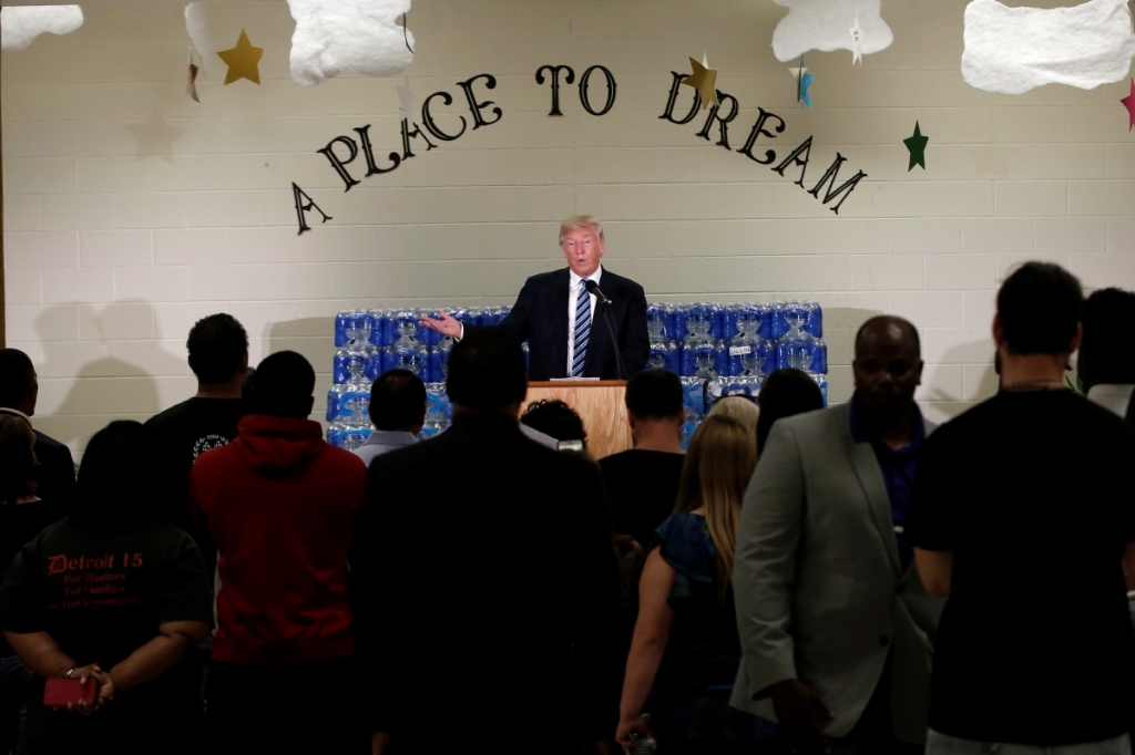 ReutersRepublican presidential nominee Donald Trump speaks to a small group at the Bethel United Methodist Church in Flint Michigan on 14 September