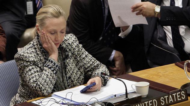 Hillary Clinton checking her phone after addressing the Security Council at the United Nations as secretary of state in 2012