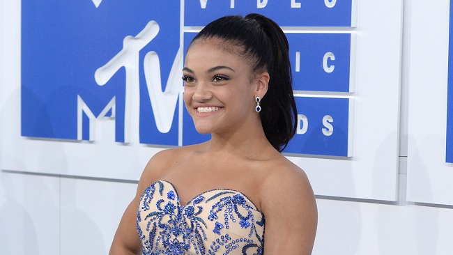 Member of the'Final Five Rio Olympics gold medal-winning U.S. Gymnastics team Laurie Hernandez arrives at the MTV Video Music Awards at Madison Square Garden on Sunday Aug. 28 2016 in New York