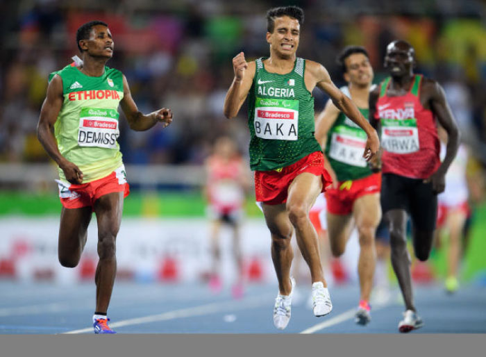 Algeria’s Abdellatif Baka narrowly wins the gold ahead of Ethiopia’s Tamiru Demisse in the men’s 1,500-meter T13 final at Olympic Stadium in Rio de Janeiro Brazil Sunday. — AP