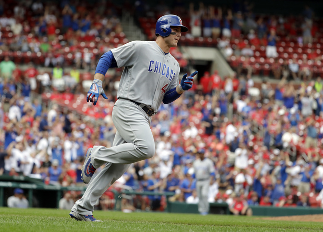 Chicago Cubs Anthony Rizzo rounds the bases after hitting a two-run home run during the ninth inning of a baseball game against the St. Louis Cardinals Wedn