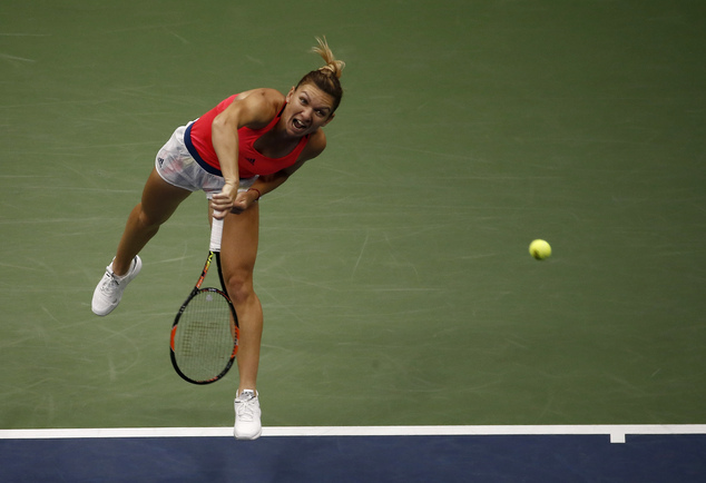 Simona Halep of Romania returns a shot to Lucie Safarova of the Czech Republic during the second round of the U.S. Open tennis tournament Thursday Sept