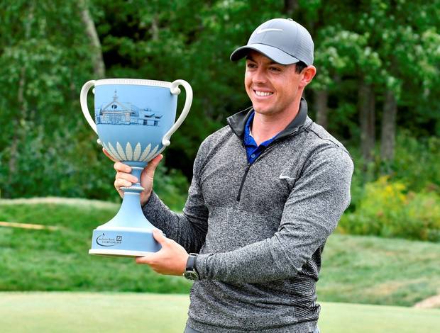 Rory Mc Ilroy holds the trophy. Pic Mark Konezny-USA TODAY Sports