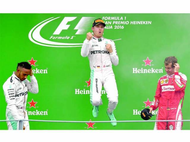 Rosberg jumps for joy on the podium after winning the Italian Grand Prix yesterday