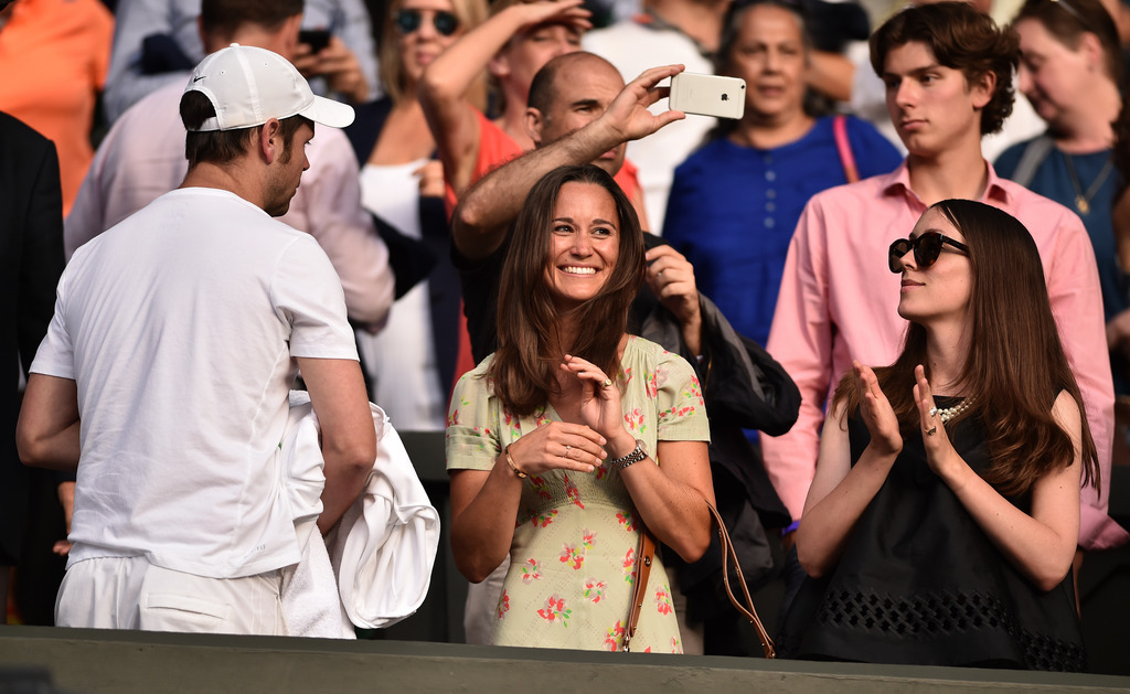 Pippa Middleton, sister of Britain's Catherine Duchess of Cambridge reacts after Switzerland's Roger Federer beat Spain's Roberto Bautista Agut in their men's singles fourth round match on day seven of the 2015 Wimbledon Champion