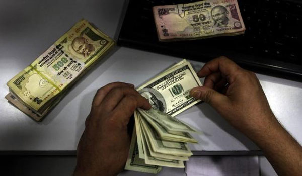 Rupee hits 4-month high against USD gains 15 paise to 66.37