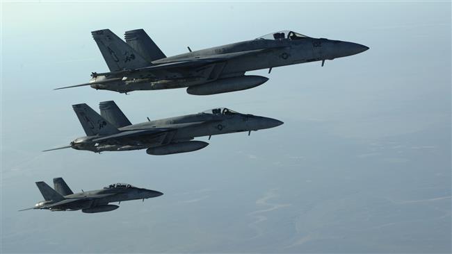 A formation of US Navy F-18E Super Hornets fly over northern Iraq after conducting a series of strikes against purported Daesh targets in Syria