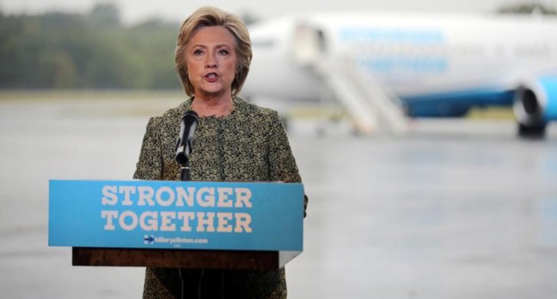 U.S. Democratic presidential candidate Hillary Clinton speaks to the media before boarding her campaign plane at the Westchester County airport in White Plains New York