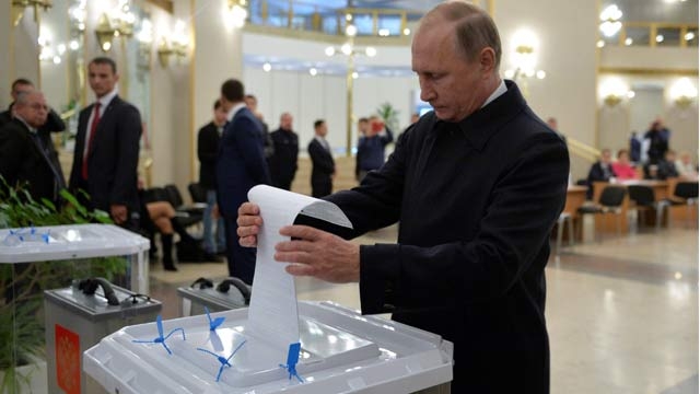 Russia votes in parliamentary polls with Putin secure