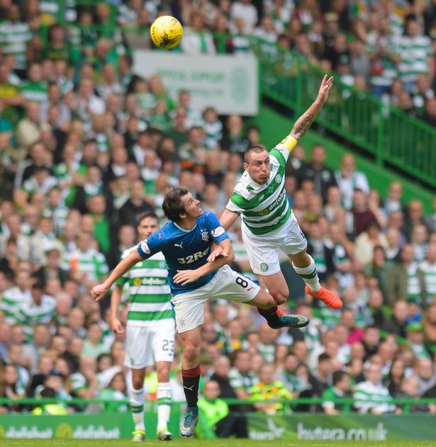 Celtic's Scott Brown with Joey Barton