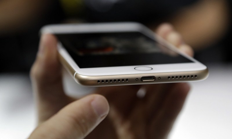 San Francisco The lightning port of an iPhone 7 is shown during an event to announce new Apple products.—AP