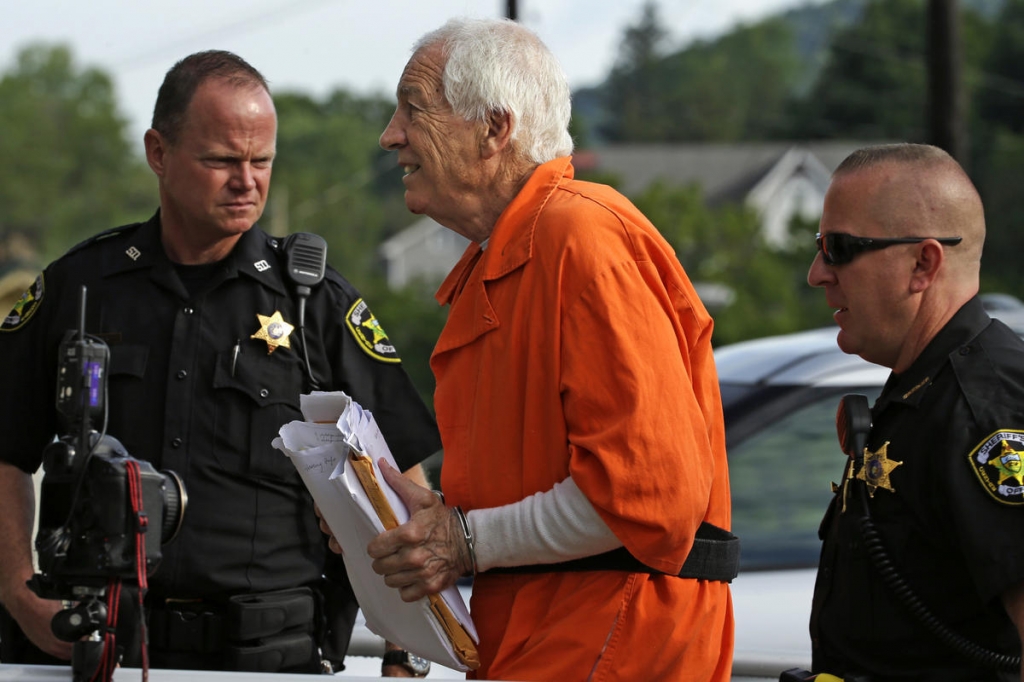 Former Penn State University assistant football coach Jerry Sandusky center arrives at the Centre County Courthouse for an appeals hearing about whether he was improperly convicted four years ago in Bellefonte Pa. Friday Aug. 12 2016