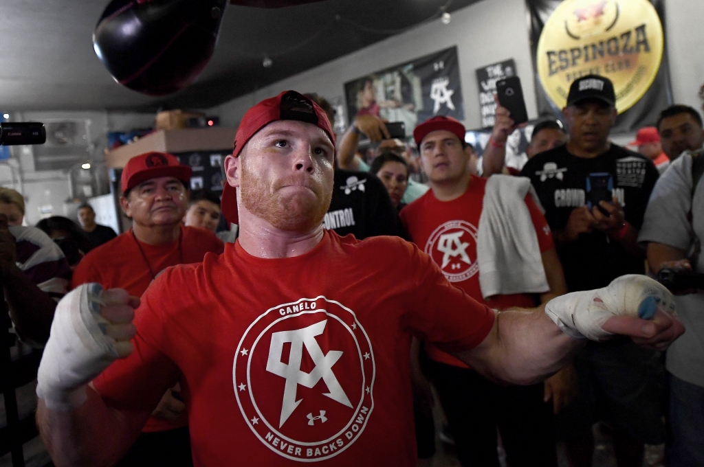 SAN DIEGO CA- AUGUST 31 Boxer Canelo Alvarez of Mexico punches the speedbag during his Open Workout at the House of Boxing