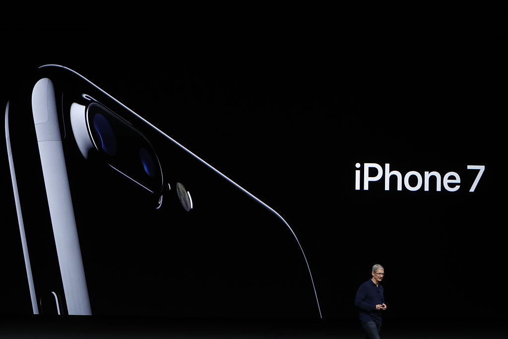 Apple CEO Tim Cook announces the new Apple iPhone 7 during a launch event